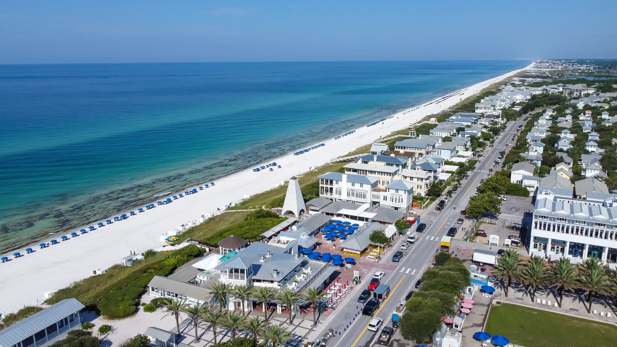 Aerial view of the white sand beach and coastal homes along 30A