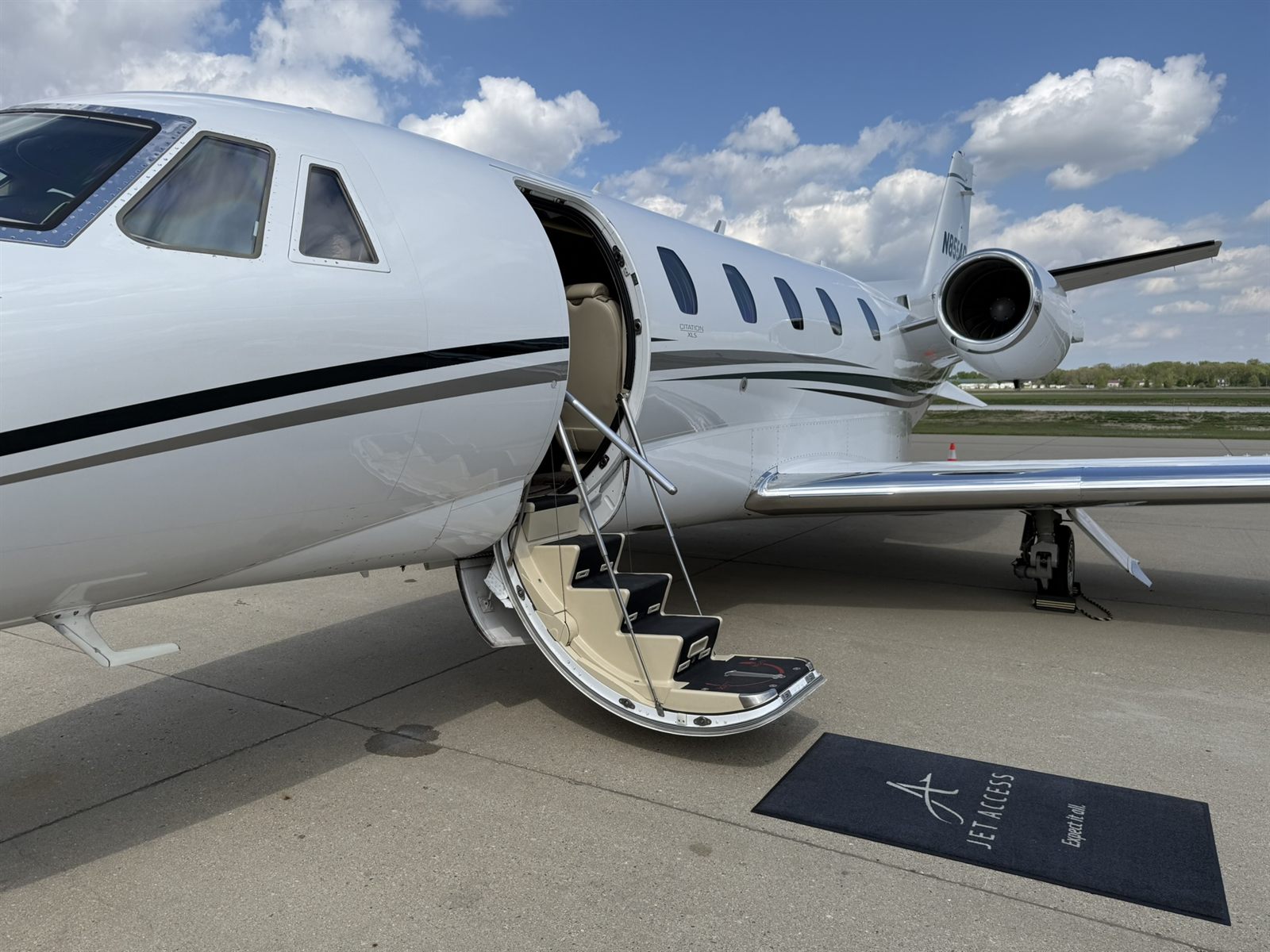 Citation XLS with the airstair down on the Jet Access ramp